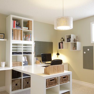Home office - traditional built-in desk home office idea in Calgary