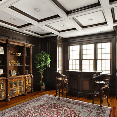 Home office - traditional medium tone wood floor home office idea in New York