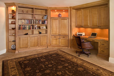 Example of a classic built-in desk home office design in Miami