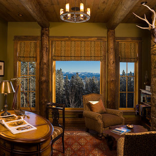 Exemple d'un bureau montagne avec une cheminée standard, un manteau de cheminée en pierre et un bureau indépendant.