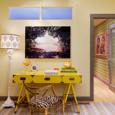 Inspiration for an eclectic freestanding desk home office remodel in San Francisco with yellow walls
