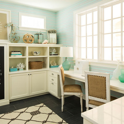 Beach style built-in desk home office photo in Minneapolis