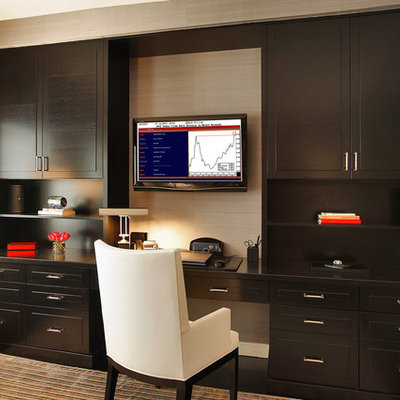 Home office - contemporary built-in desk home office idea in New York