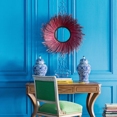 Inspiration for an eclectic freestanding desk dark wood floor and brown floor study room remodel in Chicago with blue walls