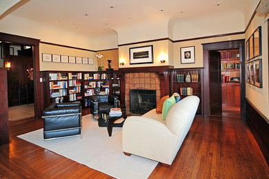 Photo of a medium sized traditional home office in San Francisco with beige walls, a standard fireplace, a tiled fireplace surround, dark hardwood flooring, a reading nook, brown floors and a chimney breast.