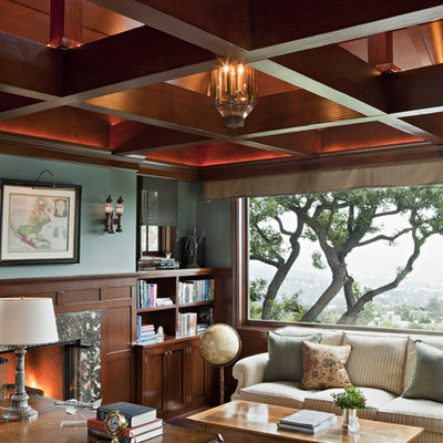 Inspiration for a timeless freestanding desk home office remodel in Los Angeles with green walls and a standard fireplace