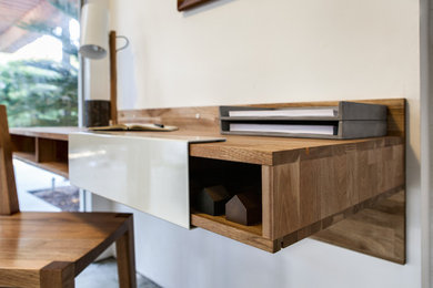 This is an example of a small contemporary home office in Los Angeles.