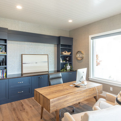 Large transitional freestanding desk light wood floor and beige floor study room photo in Salt Lake City with gray walls and no fireplace