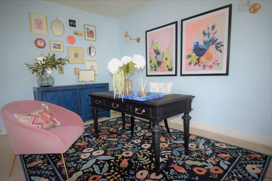 Mid-sized transitional freestanding desk carpeted and beige floor home office photo in DC Metro with blue walls