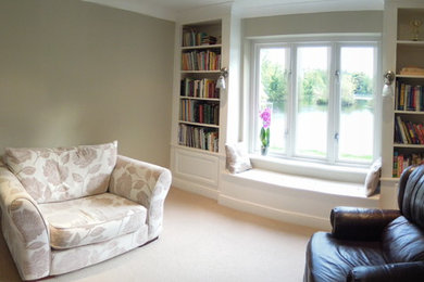 Photo of a medium sized classic study in Cambridgeshire with beige walls, carpet and no fireplace.