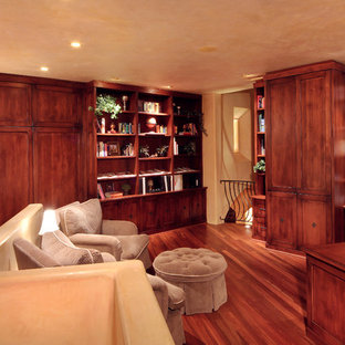 Mid-sized elegant freestanding desk dark wood floor and brown floor study room photo in Denver with beige walls and no fireplace