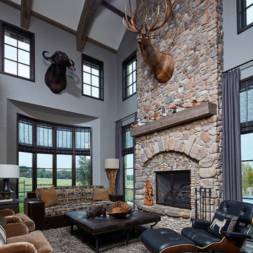 Lodge-like Office/Study/Entertainment Room with Two-Story Stone Fireplace