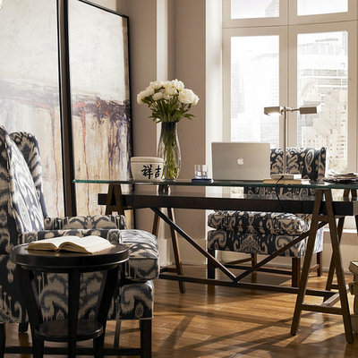Inspiration for a contemporary freestanding desk medium tone wood floor home office remodel in Charlotte
