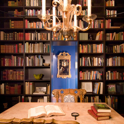 Eclectic freestanding desk home office library photo in DC Metro with black walls