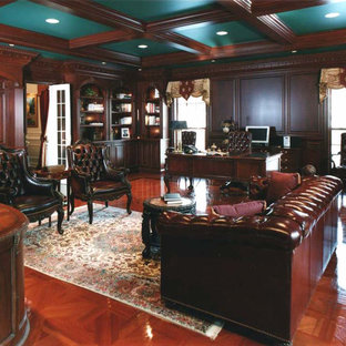 Large ornate freestanding desk study room photo in Chicago with brown walls
