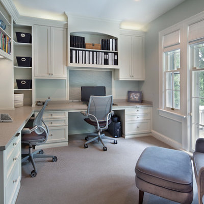 Example of a transitional built-in desk home office design in DC Metro