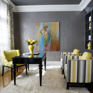 Home office - mid-sized contemporary freestanding desk medium tone wood floor home office idea in DC Metro with gray walls