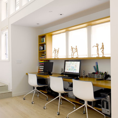 Home office - contemporary built-in desk home office idea in Seattle
