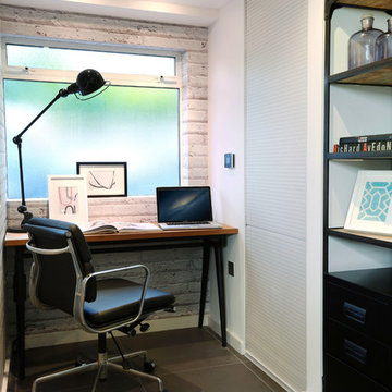 Mid century modern home office with brick effect wallpaper
