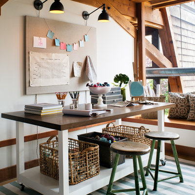 Home studio - contemporary freestanding desk home studio idea in San Francisco with white walls