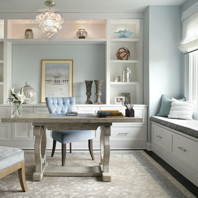 Inspiration for a transitional home office remodel in New York with blue walls