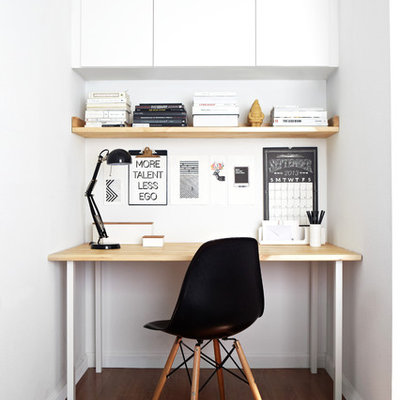 Inspiration for a small scandinavian freestanding desk dark wood floor home office remodel in San Francisco with white walls