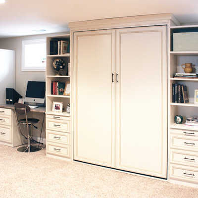 Example of a large classic built-in desk carpeted and beige floor home office design in Phoenix with beige walls and no fireplace