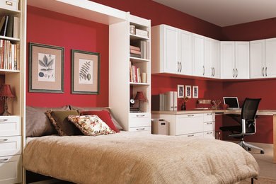 Design ideas for a large classic study in Other with red walls, carpet, a built-in desk, no fireplace and beige floors.