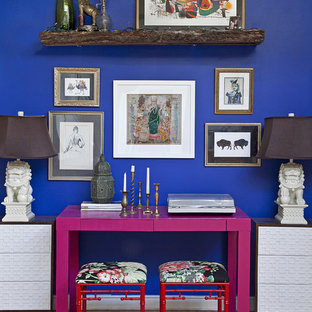 Example of an eclectic freestanding desk medium tone wood floor home office design in Philadelphia with blue walls