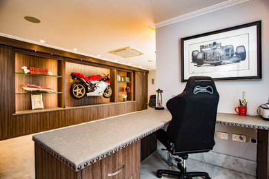 This is an example of a contemporary home office in Buckinghamshire with marble flooring and white floors.