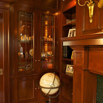 New Jersey Residence Mahogany Library Cabinetry with art glass doors.