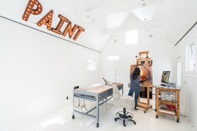 Traditional home studio in Nashville with white walls, a freestanding desk and white floors.