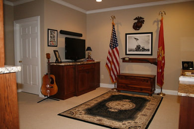 Example of a mid-sized classic built-in desk carpeted study room design in Other with beige walls and no fireplace
