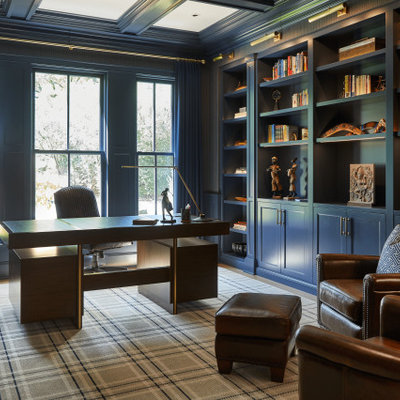 Mid-sized cottage freestanding desk light wood floor, beige floor, coffered ceiling and wallpaper home office library photo in Chicago with blue walls