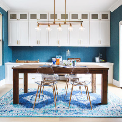 Example of a beach style freestanding desk light wood floor home office design in San Diego with blue walls and no fireplace
