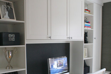 Example of a trendy home office design in Toronto