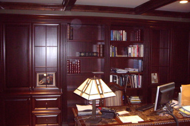 Example of a mid-sized classic built-in desk study room design in New York