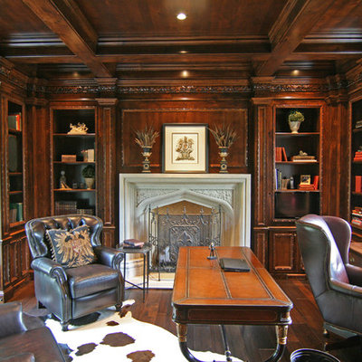 Home office - traditional built-in desk dark wood floor home office idea in Minneapolis