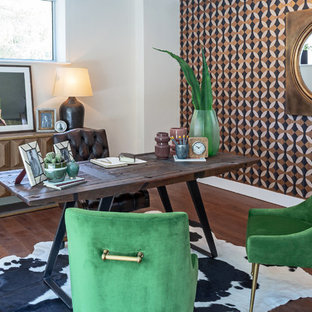 This is an example of an eclectic home office in Berkshire with white walls, dark hardwood flooring, a freestanding desk and brown floors.