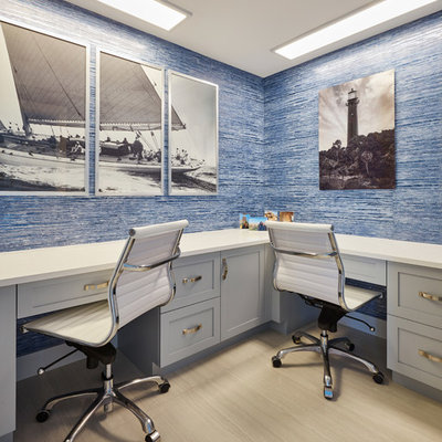 Inspiration for a coastal built-in desk beige floor study room remodel in Miami with blue walls and no fireplace