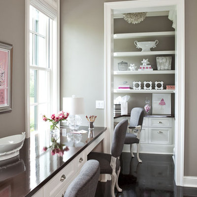 Home office - mid-sized traditional built-in desk painted wood floor home office idea in Minneapolis with no fireplace and gray walls