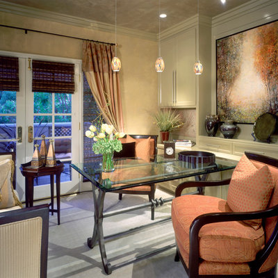 Inspiration for a contemporary freestanding desk carpeted home office remodel in Orange County with beige walls