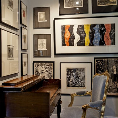 Example of a trendy freestanding desk dark wood floor home office design in Denver with gray walls