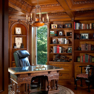 Home office - traditional freestanding desk medium tone wood floor home office idea in New York