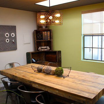 Reclaimed wood conference table and Marais A Chairs