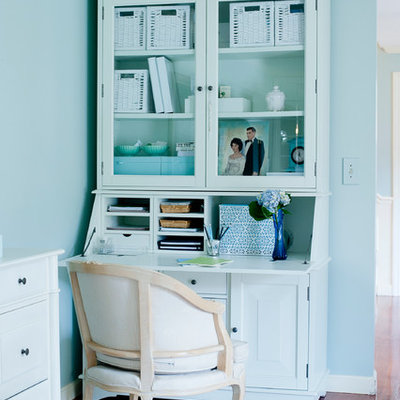 Inspiration for an eclectic home office remodel in Boston with blue walls