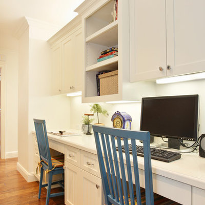 Home office - traditional built-in desk home office idea in San Diego