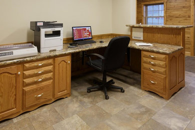 Example of a mid-sized classic built-in desk ceramic tile and beige floor study room design in Other with white walls and no fireplace