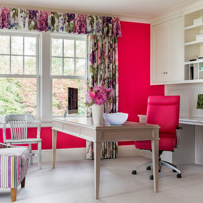 Transitional freestanding desk carpeted and beige floor study room photo in Boston with pink walls