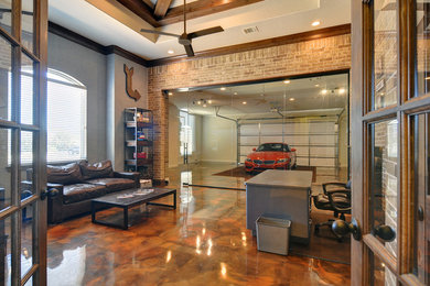 Example of a large urban freestanding desk concrete floor study room design in Dallas with gray walls and no fireplace